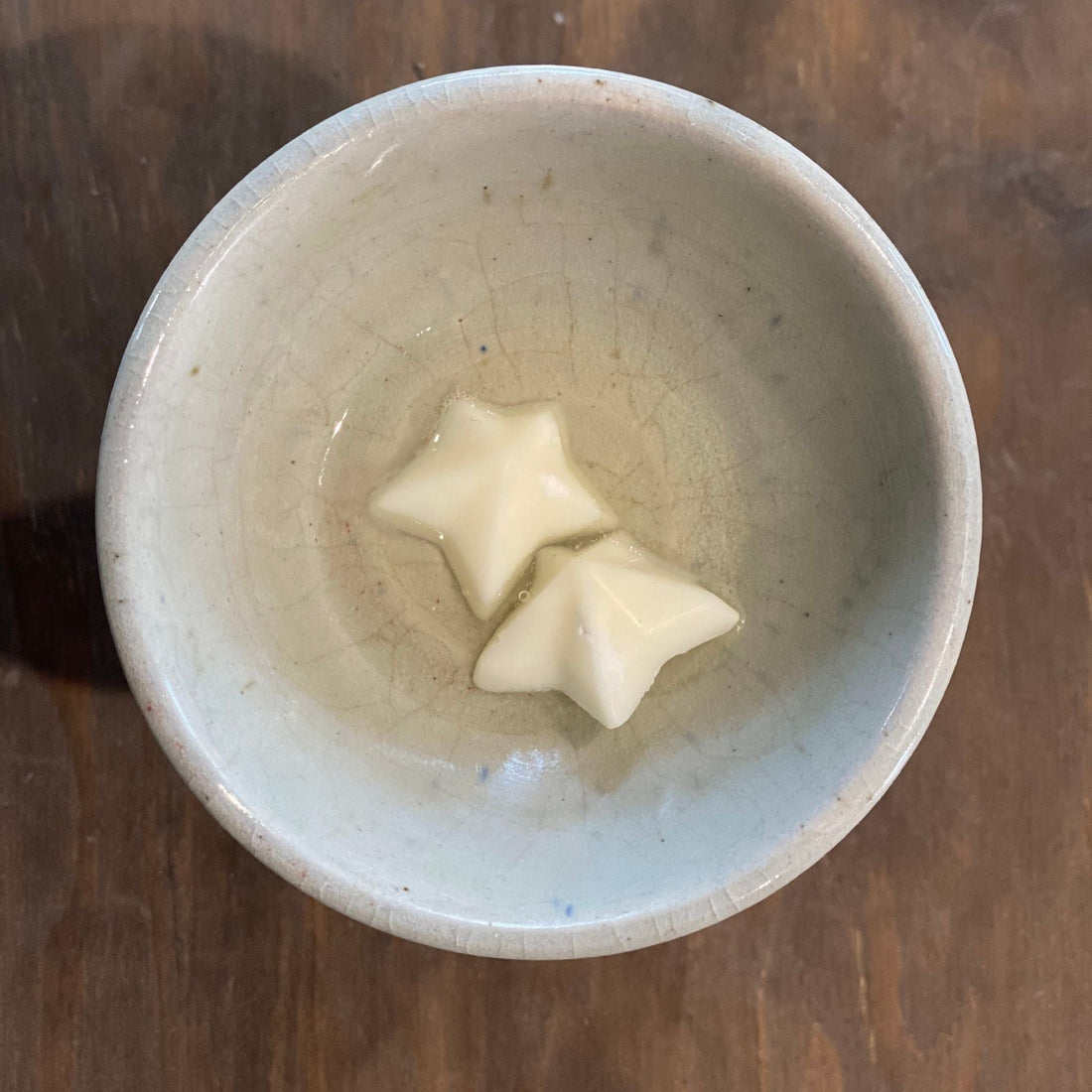 top view of wax melt stars melting in wax warmer