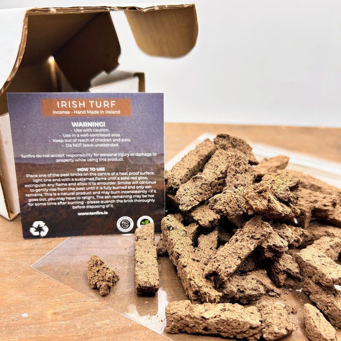 irish turf incense laid out with box and safety label