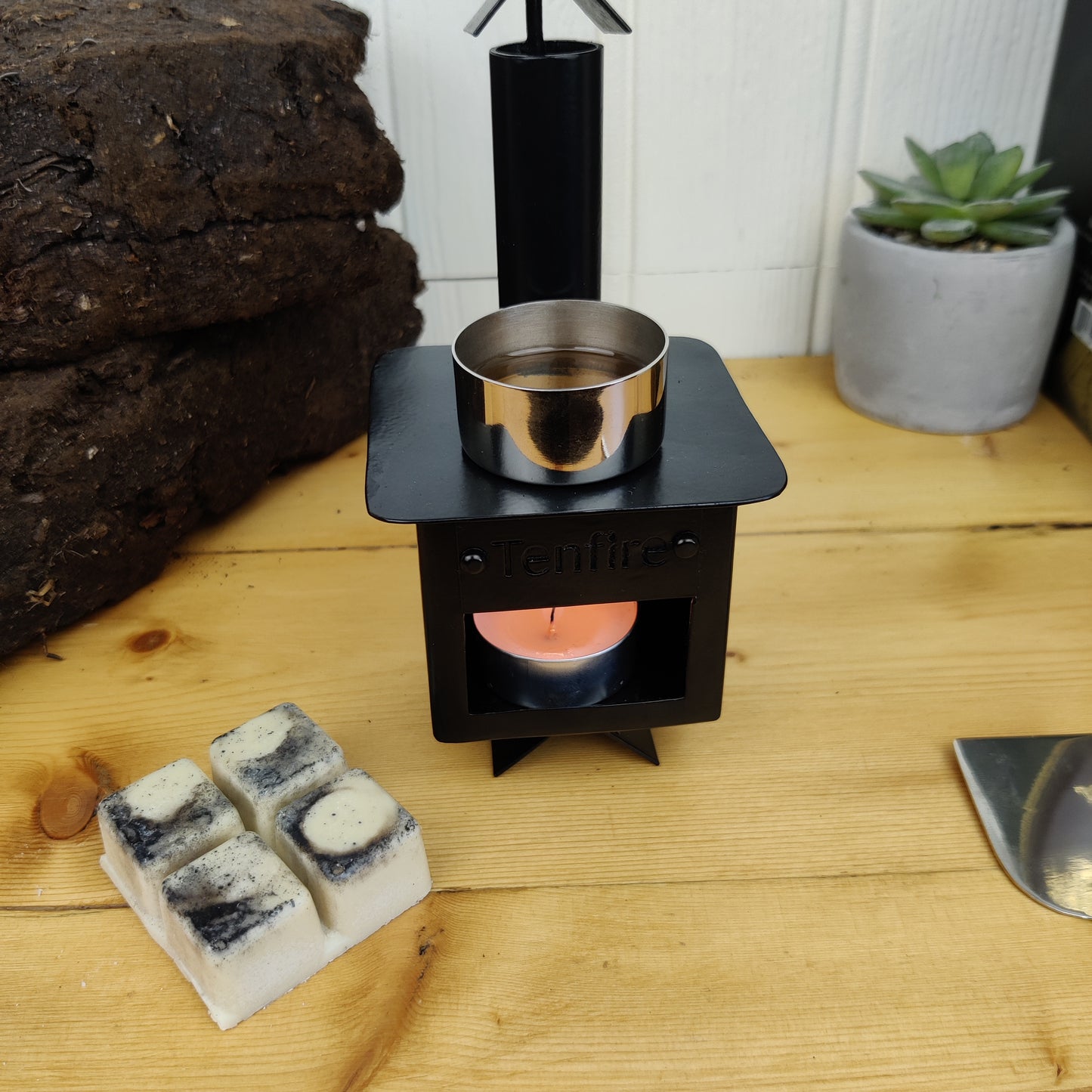 Wax melts being used with the burner