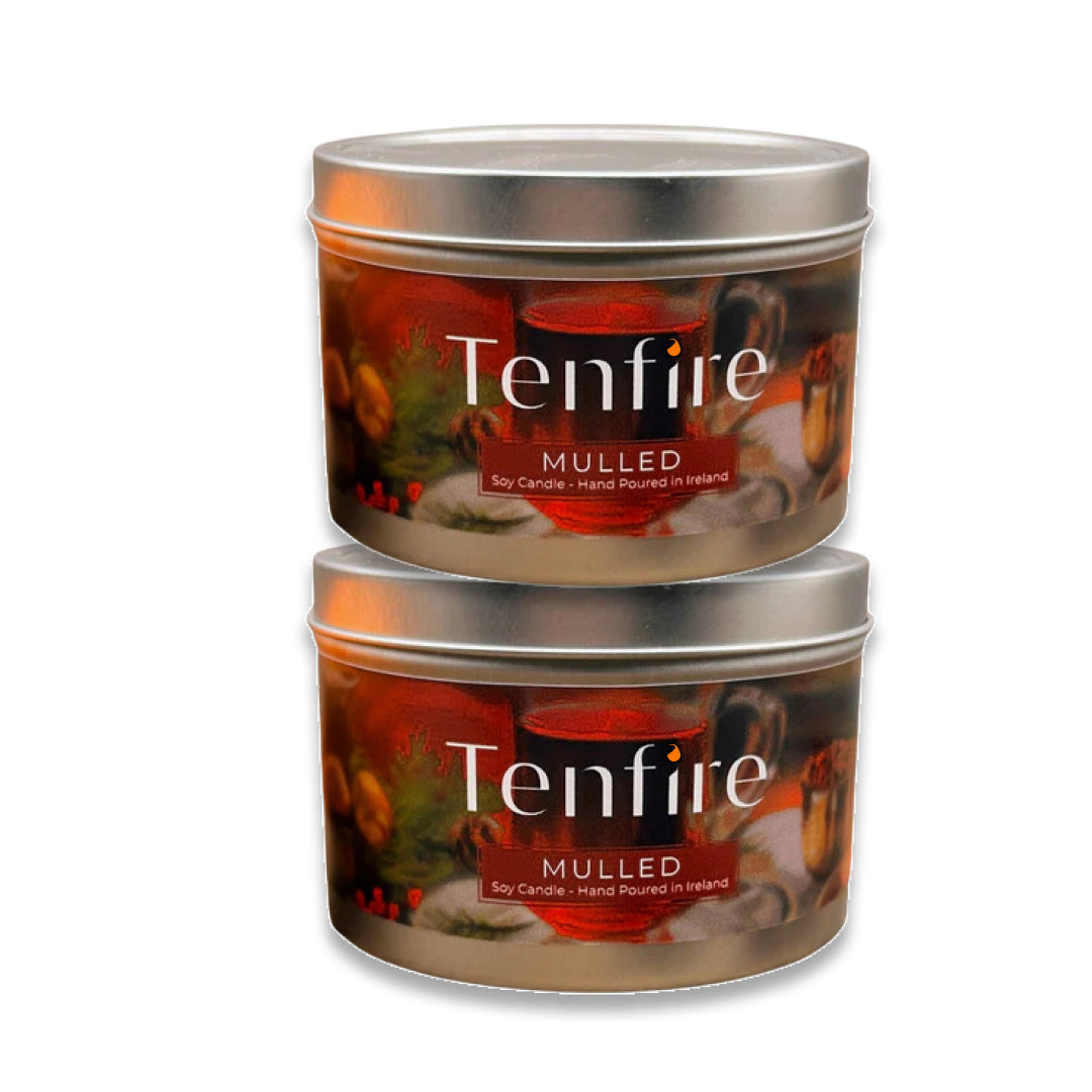Two tins of Tenfire Mulled candle on a white background